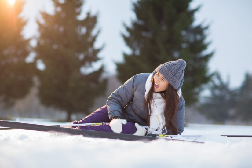 Slip And Fall Woman Holding Her Knee In Pain