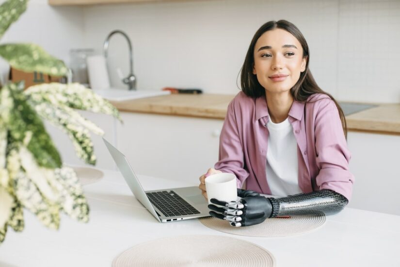 Prosthetic Arm A Woman With A Robotic Arm Drinking Tea